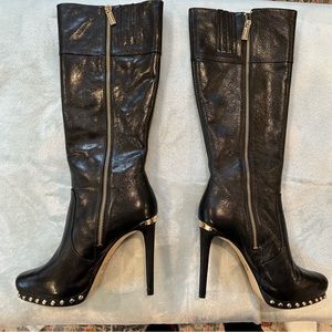 Black and gold studded Michael Kors 4 1/2 inch heeled leather boots.